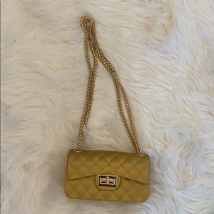 Gold tone/yellow faux quilted rubber crossbody
